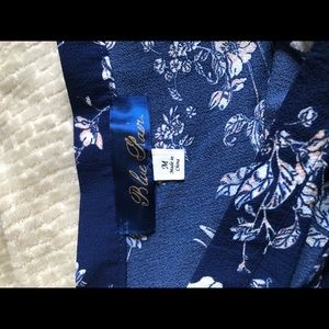 Wrap-midi skirt. Size M. Navy with white and pink floral pattern.